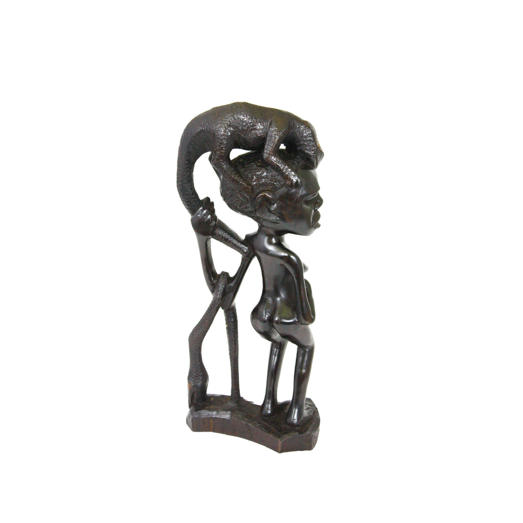 A Female Shetani with Lizard